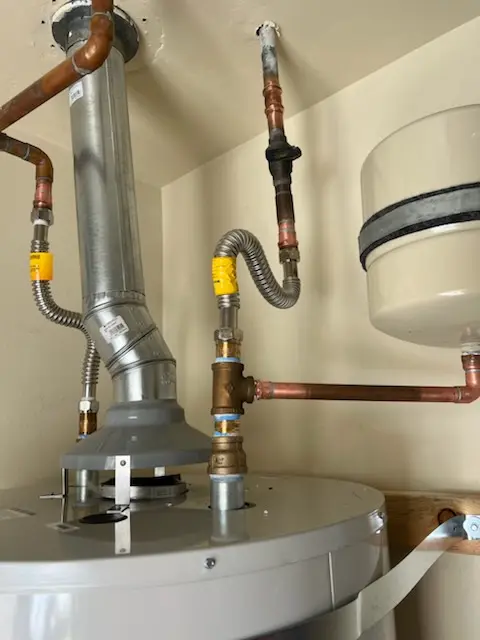 Water heater installation and plumbing repair in Small Crossings
